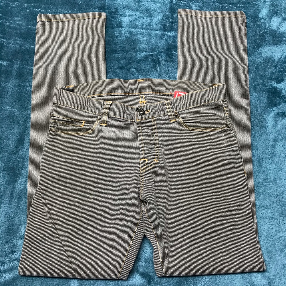 Rank pinstriped denim jeans.